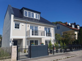 Exklusive Neubau Dachterrassenwohnung mit Wohnungslift in Vierfamilienvilla